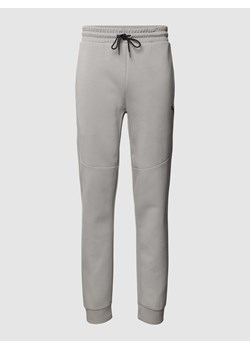 Spodnie typu track pants z elastycznym pasem ze sklepu Peek&Cloppenburg  w kategorii Spodnie męskie - zdjęcie 167669738