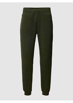 Spodnie dresowe z wpuszczanymi kieszeniami ze sklepu Peek&Cloppenburg  w kategorii Spodnie męskie - zdjęcie 167674885