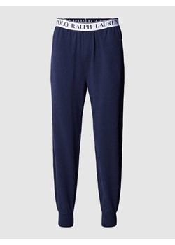 Spodnie dresowe z elastycznym pasem z logo ze sklepu Peek&Cloppenburg  w kategorii Spodnie męskie - zdjęcie 167819046