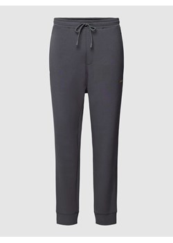 Spodnie dresowe z tunelem model ‘Hadiko’ ze sklepu Peek&Cloppenburg  w kategorii Spodnie męskie - zdjęcie 167851627