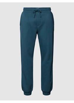 Spodnie dresowe z wpuszczanymi kieszeniami po bokach ze sklepu Peek&Cloppenburg  w kategorii Spodnie męskie - zdjęcie 167851837
