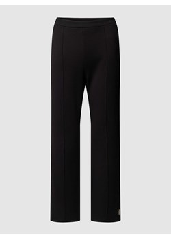 Spodnie materiałowe o luźnym kroju z szeroką nogawką w kant ze sklepu Peek&Cloppenburg  w kategorii Spodnie damskie - zdjęcie 167930206