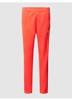 Spodnie dresowe z nadrukiem z logo model ‘TIRO’ ze sklepu Peek&Cloppenburg  w kategorii Spodnie damskie - zdjęcie 167941057