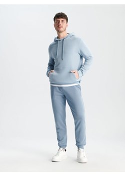 Sinsay - Spodnie dresowe jogger - błękitny ze sklepu Sinsay w kategorii Spodnie męskie - zdjęcie 167948199
