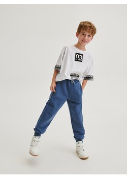 Reserved - Dresowe joggery z zamkami - niebieski ze sklepu Reserved w kategorii Spodnie chłopięce - zdjęcie 167948739