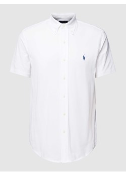 Koszulka polo z kołnierzykiem w jednolitym kolorze ze sklepu Peek&Cloppenburg  w kategorii Koszule męskie - zdjęcie 167963638