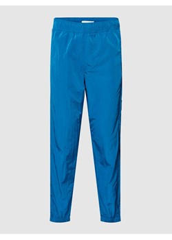 Spodnie materiałowe z elastycznymi wykończeniami ze sklepu Peek&Cloppenburg  w kategorii Spodnie męskie - zdjęcie 168084638
