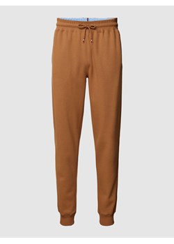 Spodnie dresowe z tunelem model ‘TRACK PANT’ ze sklepu Peek&Cloppenburg  w kategorii Spodnie męskie - zdjęcie 168105456