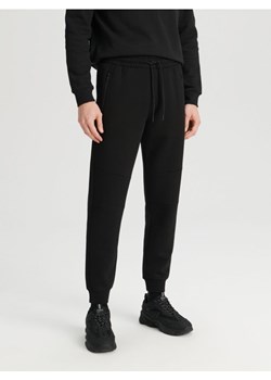 Sinsay - Spodnie dresowe jogger - czarny ze sklepu Sinsay w kategorii Spodnie męskie - zdjęcie 168157688