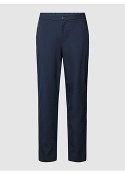 Spodnie materiałowe o kroju slim tapered fit z elastycznym pasem model ‘DANN’ ze sklepu Peek&Cloppenburg  w kategorii Spodnie męskie - zdjęcie 168222716