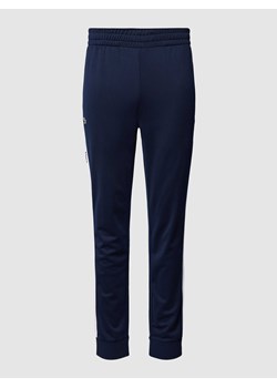 Spodnie dresowe z paskami z logo ze sklepu Peek&Cloppenburg  w kategorii Spodnie męskie - zdjęcie 168222898