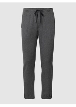 Spodnie dresowe z tunelem model 'Enjoy' ze sklepu Peek&Cloppenburg  w kategorii Spodnie męskie - zdjęcie 168304955