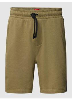 Spodnie dresowe z detalami z logo model ‘Sporty’ ze sklepu Peek&Cloppenburg  w kategorii Spodenki męskie - zdjęcie 168307657