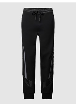 Spodnie dresowe z wpuszczanymi kieszeniami model ‘Hadikon’ ze sklepu Peek&Cloppenburg  w kategorii Spodnie męskie - zdjęcie 168307795