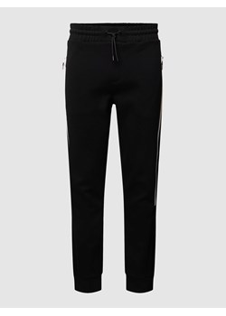 Spodnie dresowe kieszenią z tyłu model ‘Lamont’ ze sklepu Peek&Cloppenburg  w kategorii Spodnie damskie - zdjęcie 168308105