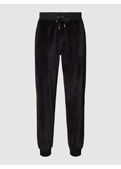 Spodnie dresowe z elastycznym ściągaczem ze sklepu Peek&Cloppenburg  w kategorii Spodnie męskie - zdjęcie 168309116