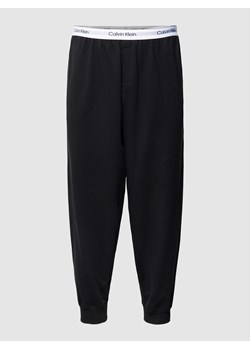 Spodnie dresowe PLUS SIZE z paskiem z logo model ‘Jogger’ ze sklepu Peek&Cloppenburg  w kategorii Spodnie męskie - zdjęcie 168312027