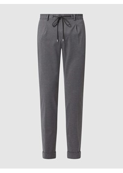 Spodnie sportowe z plisami w pasie ze sklepu Peek&Cloppenburg  w kategorii Spodnie męskie - zdjęcie 168313648
