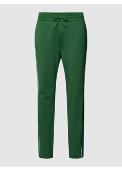Spodnie dresowe z wypustkami w kontrastowym kolorze model ‘Lamont’ ze sklepu Peek&Cloppenburg  w kategorii Spodnie męskie - zdjęcie 168318756
