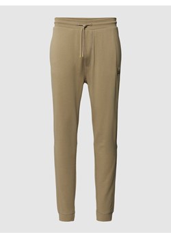 Spodnie dresowe z elastycznym ściągaczem ze sklepu Peek&Cloppenburg  w kategorii Spodnie męskie - zdjęcie 168320967