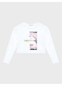 Calvin Klein Jeans Bluzka Polaroid IG0IG01805 Biały Regular Fit ze sklepu MODIVO w kategorii Bluzki dziewczęce - zdjęcie 168379899