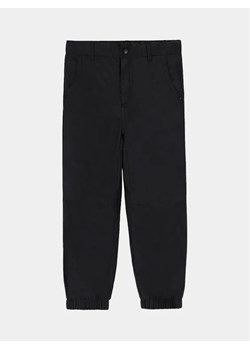 Coccodrillo Spodnie materiałowe ZC3119701OBK Czarny Regular Fit ze sklepu MODIVO w kategorii Spodnie chłopięce - zdjęcie 168387247