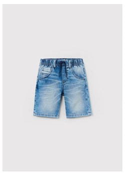 OVS Szorty jeansowe 1442679 Niebieski Regular Fit ze sklepu MODIVO w kategorii Spodenki chłopięce - zdjęcie 168389607