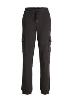 Jack&Jones Junior Spodnie dresowe 12237198 Czarny Relaxed Fit ze sklepu MODIVO w kategorii Spodnie chłopięce - zdjęcie 168393656