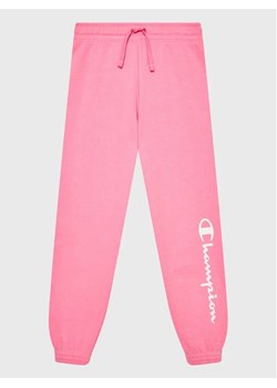 Champion Spodnie dresowe 404608 Różowy Regular Fit ze sklepu MODIVO w kategorii Spodnie dziewczęce - zdjęcie 168394817