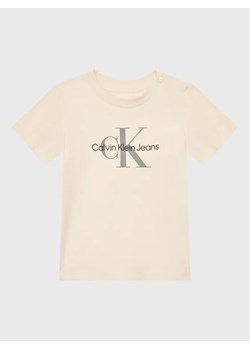 Calvin Klein Jeans T-Shirt Monogram IN0IN00001 Beżowy Regular Fit ze sklepu MODIVO w kategorii T-shirty chłopięce - zdjęcie 168397657