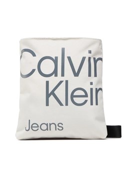 Calvin Klein Jeans Saszetka Sport Essentials Flatpack18 Aop K50K509825 Beżowy ze sklepu MODIVO w kategorii Saszetki - zdjęcie 168398487