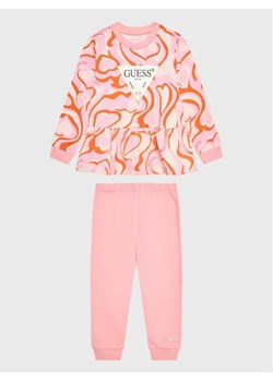 Guess Komplet bluzka i spodnie K3YG00 KA6R3 Różowy Regular Fit ze sklepu MODIVO w kategorii Komplety dziewczęce - zdjęcie 168427215