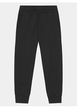 OVS Spodnie dresowe 1819464 Czarny Regular Fit ze sklepu MODIVO w kategorii Spodnie chłopięce - zdjęcie 168452808