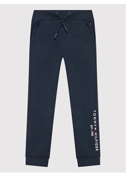 Tommy Hilfiger Spodnie dresowe KG0KG06598 Granatowy Regular Fit ze sklepu MODIVO w kategorii Spodnie chłopięce - zdjęcie 168454937