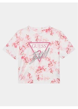 Guess T-Shirt J4RI06 K6YW3 Różowy Boxy Fit ze sklepu MODIVO w kategorii Bluzki dziewczęce - zdjęcie 168460209