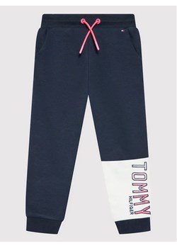 Tommy Hilfiger Spodnie dresowe KG0KG06600 D Granatowy Regular Fit ze sklepu MODIVO w kategorii Spodnie chłopięce - zdjęcie 168461267