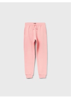 OVS Spodnie dresowe 1593217 Różowy Regular Fit ze sklepu MODIVO w kategorii Spodnie dziewczęce - zdjęcie 168466597
