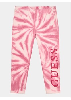 Guess Legginsy K3YB00 J1313 Różowy Slim Fit ze sklepu MODIVO w kategorii Spodnie dziewczęce - zdjęcie 168470105