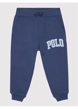 Polo Ralph Lauren Spodnie dresowe 321851015003 Granatowy Regular Fit ze sklepu MODIVO w kategorii Spodnie chłopięce - zdjęcie 168470945