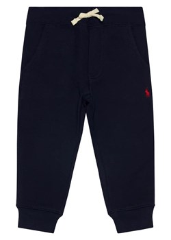 Polo Ralph Lauren Spodnie dresowe Core Replen 321720897003 Granatowy Regular Fit ze sklepu MODIVO w kategorii Spodnie chłopięce - zdjęcie 168472329