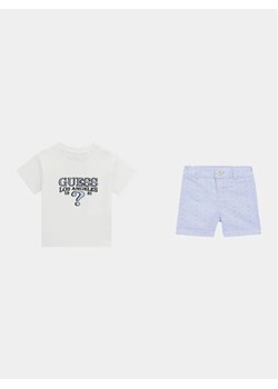 Guess Komplet t-shirt i spodenki I4RG08 K5M20 Biały Regular Fit ze sklepu MODIVO w kategorii Komplety niemowlęce - zdjęcie 168475728
