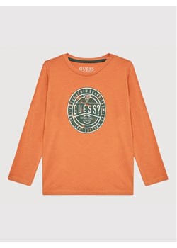 Guess Bluzka N2YI22 K8HM0 Pomarańczowy Regular Fit ze sklepu MODIVO w kategorii T-shirty chłopięce - zdjęcie 168479829