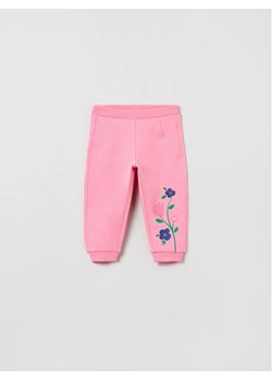 OVS Spodnie dresowe 1621588 Różowy Regular Fit ze sklepu MODIVO w kategorii Spodnie dziewczęce - zdjęcie 168484959