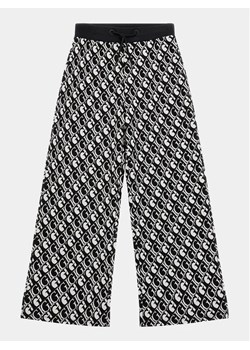 Guess Spodnie dresowe J4RQ14 KC2X2 Czarny Regular Fit ze sklepu MODIVO w kategorii Spodnie dziewczęce - zdjęcie 168486815