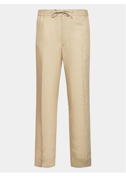 J.Lindeberg Spodnie materiałowe Baron FMPA08293 Beżowy Regular Fit ze sklepu MODIVO w kategorii Spodnie męskie - zdjęcie 168497436