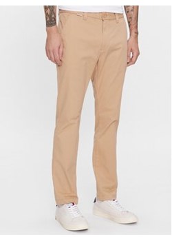 Tommy Jeans Chinosy DM0DM16758 Beżowy Slim Fit ze sklepu MODIVO w kategorii Spodnie męskie - zdjęcie 168507545