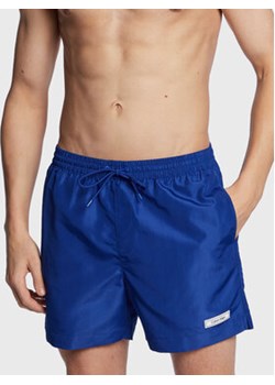 Calvin Klein Swimwear Szorty kąpielowe KM0KM00812 Niebieski Regular Fit ze sklepu MODIVO w kategorii Kąpielówki - zdjęcie 168508797
