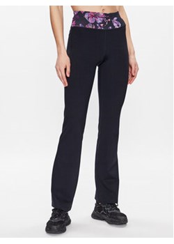 Skechers Spodnie dresowe Go Flex WPT203 Czarny Flare Fit ze sklepu MODIVO w kategorii Spodnie damskie - zdjęcie 168510229