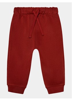 United Colors Of Benetton Spodnie dresowe 3EB5GF030 Czerwony Regular Fit ze sklepu MODIVO w kategorii Spodnie chłopięce - zdjęcie 168511216