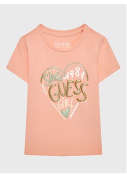 Guess T-Shirt K3GI08 K6YW1 Różowy Regular Fit ze sklepu MODIVO w kategorii Bluzki dziewczęce - zdjęcie 168514328